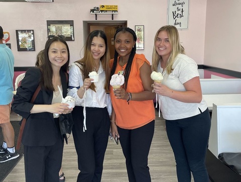 Four SHPEP students stand with ice cream cones
