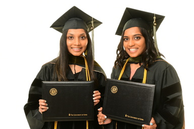 Graduates with diplomas