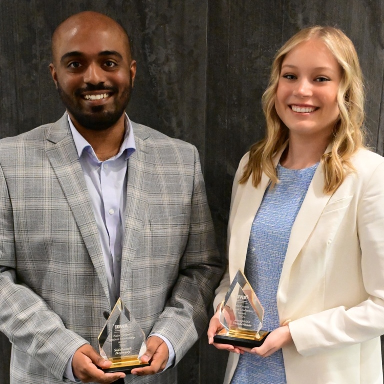 Zada Cooper Leadership Award winners Siddhanth Hejmady (left) and Josie Vonderhaar (right) holding their awards.
