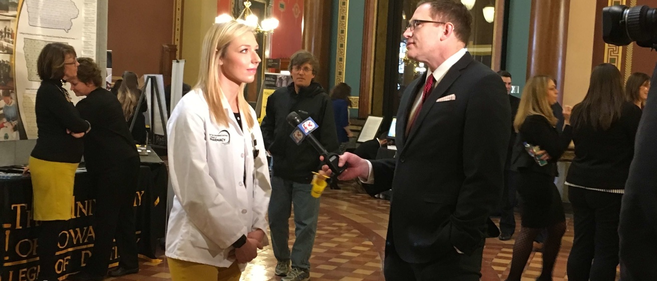 Jessica Coon being interviewed at the State Capitol