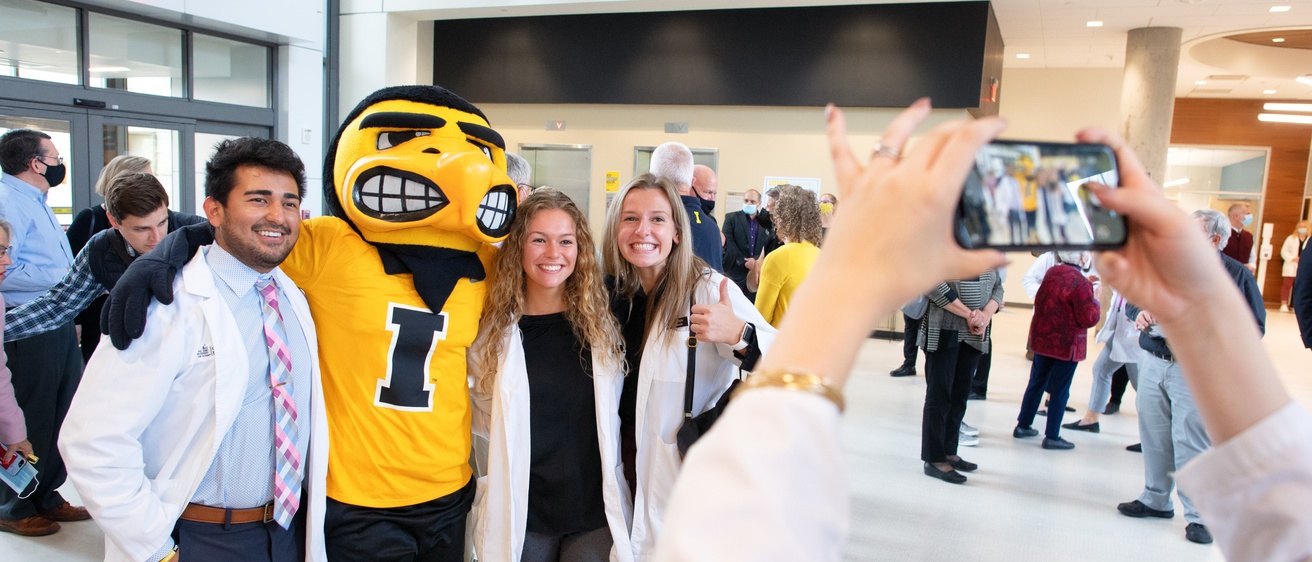 Herky and Students