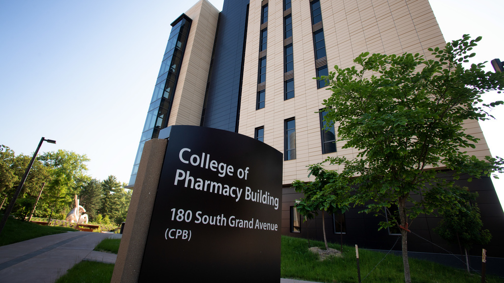 Exterior of Building with College of Pharmacy Sign in Front