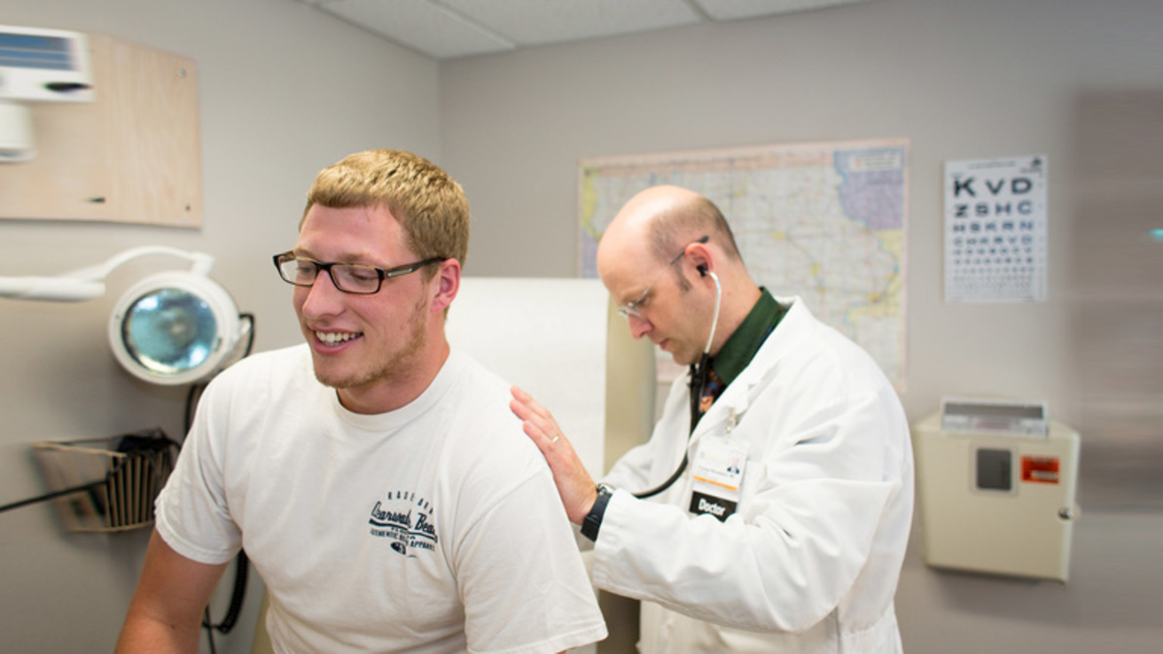 UI Student Health Male Doctor Examining Male Patient.jpg